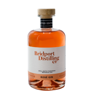 A bottle of Bridport Distilling Co's limited edition Rosé gin on a white background
